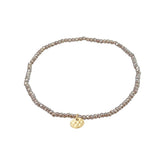 Bracelet Indie gris, plaqué or