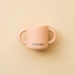 Tasse d'apprentissage avec poignées