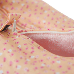 Petite trousse fleurs fond orangé cylindre