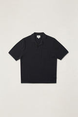 Polo en maille texturée à surjets